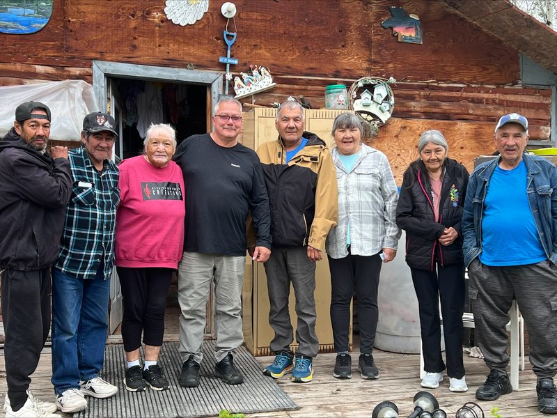 Felix Walker (centre) visiting Lloyd and Bella Flett and relatives at their campsite.