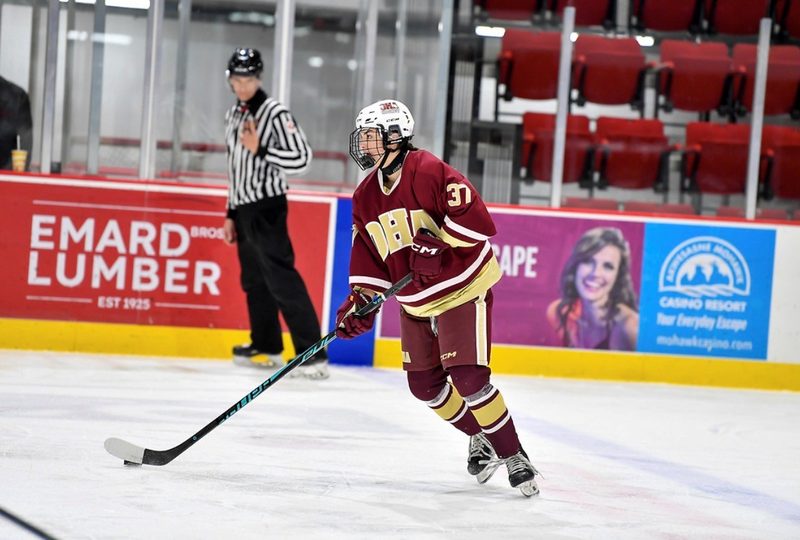 Haley Braun playing hockey.